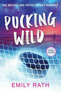 Pucking Wild: A Reverse Age Gap Hockey Romance - Paperback